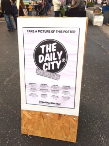 The Daily City sandwich board